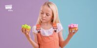 i should vs. i like - child holding cupcake